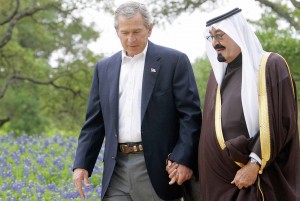George W. Bush holds hands with Saudi Crown Prince Abdullah in April, 2005